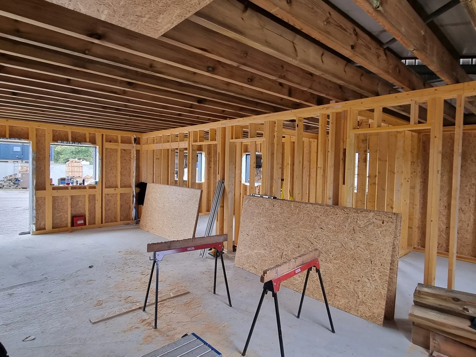 Timber frame partitions under a new floor